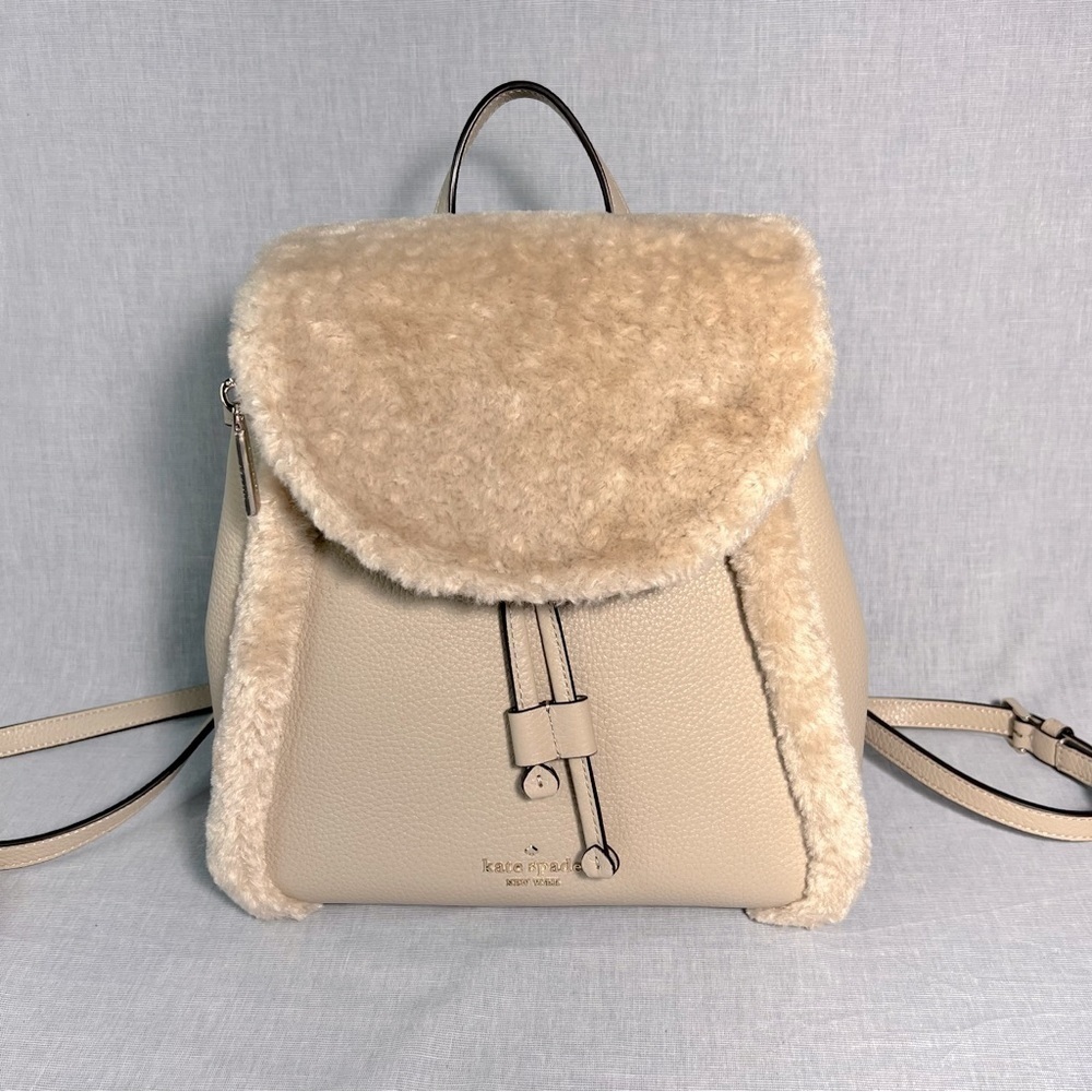 Kate Spade K9398 Leila Flap Backpack with Faux Shearling in Light Sand.